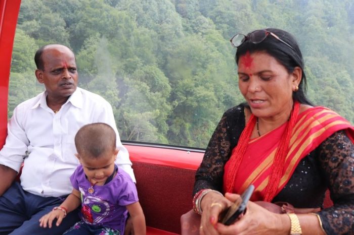 A family in the cable car of Chandragiri Hills Station Kathmandu Nepal Cable car places Travel Visit Outing Destination Pictures